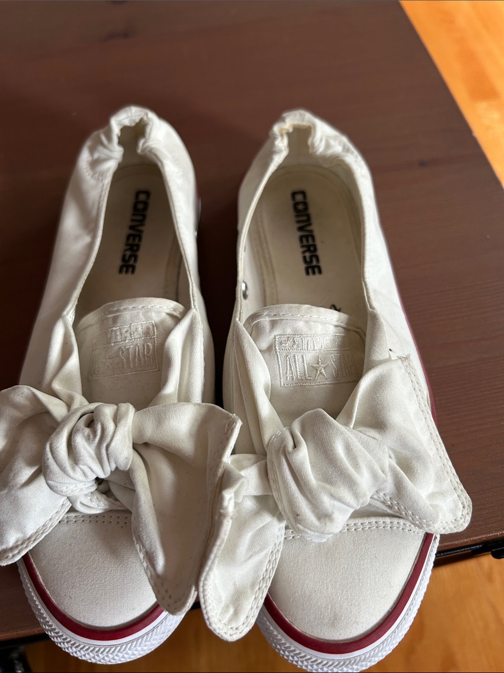 Converse White Canvas Slip-On Bow Sneakers with Red Trim